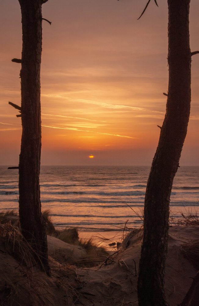 Newborough Beach and Llanddwyn Island at sunset, Isle of Anglesey