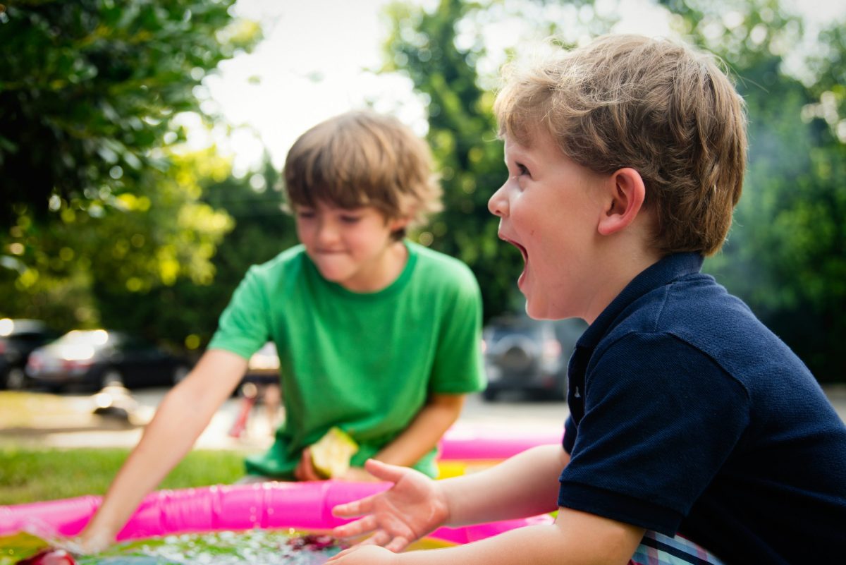 toddler playing with older child. Things to do for toddlers in North Wales.
