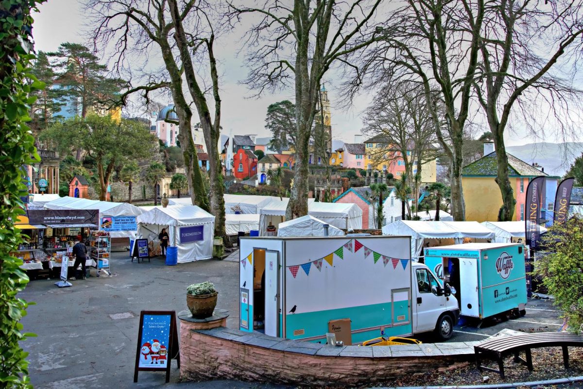 An image of a winter market and food stalls awaiting guest entry in Portmeirion, North Wales