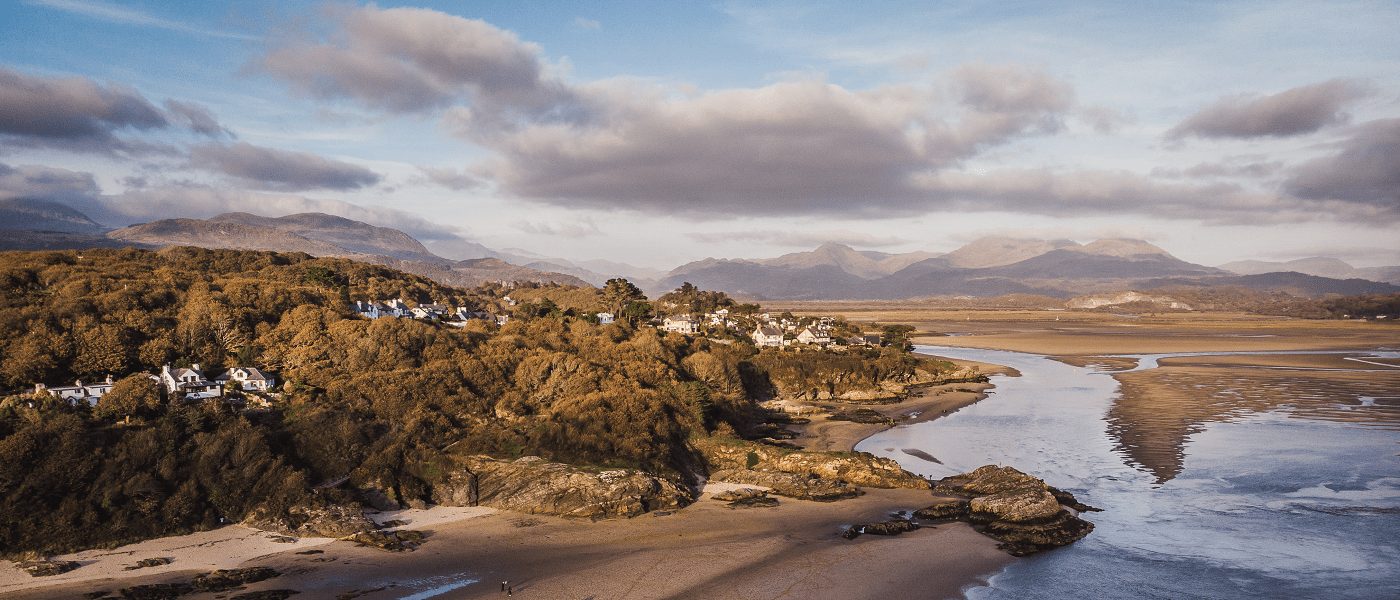 Borth y Gest holiday homes from Oyster Holiday Cottages. Aerial view over Borth y Gest beach.