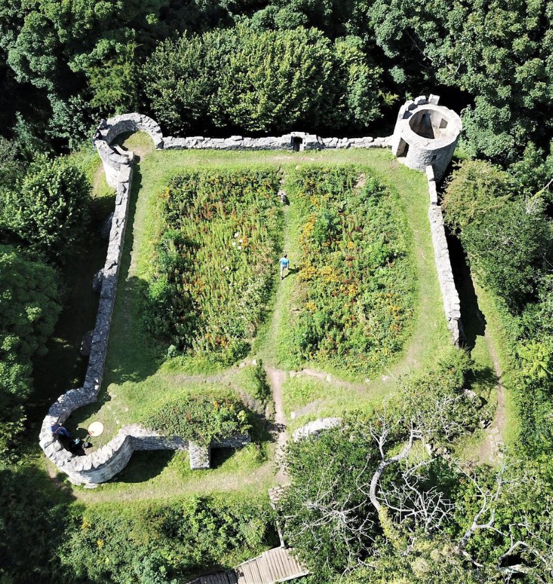 Castell Aberlleiniog Norman motte-and-bailey ruins in woodland on the Isle of Anglesey