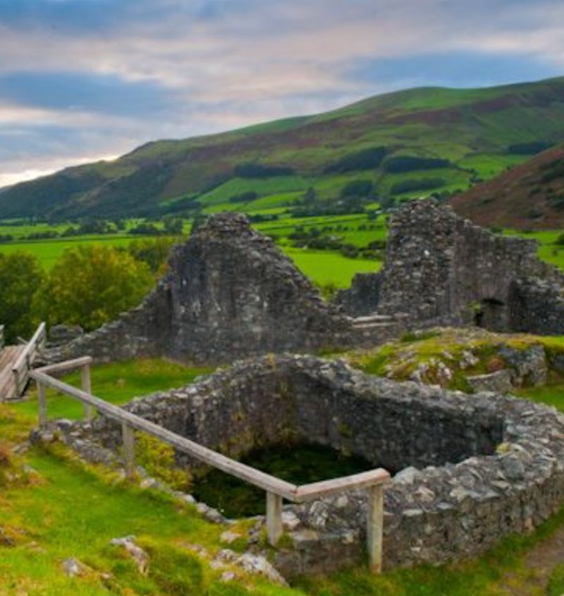 Castell y Bere ruined Welsh castle surrounded by green hills in southern Snowdonia