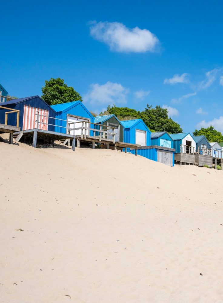 Abersoch Main Beach on the Llyn Peninsula with colourful beach huts and soft golden sand