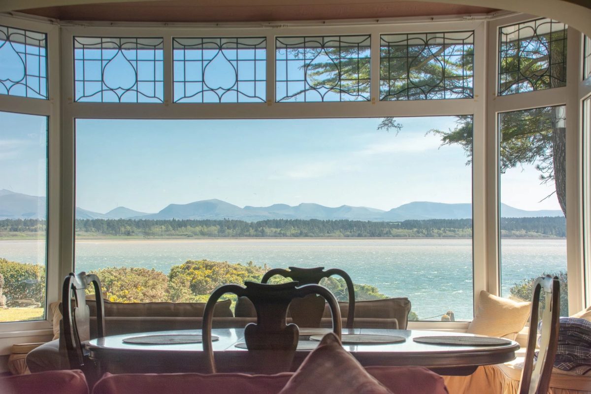 Big open window with sea view at Warren Point Holiday Cottage in Malltreath, Anglesey near Newborough Forest and Beach.
