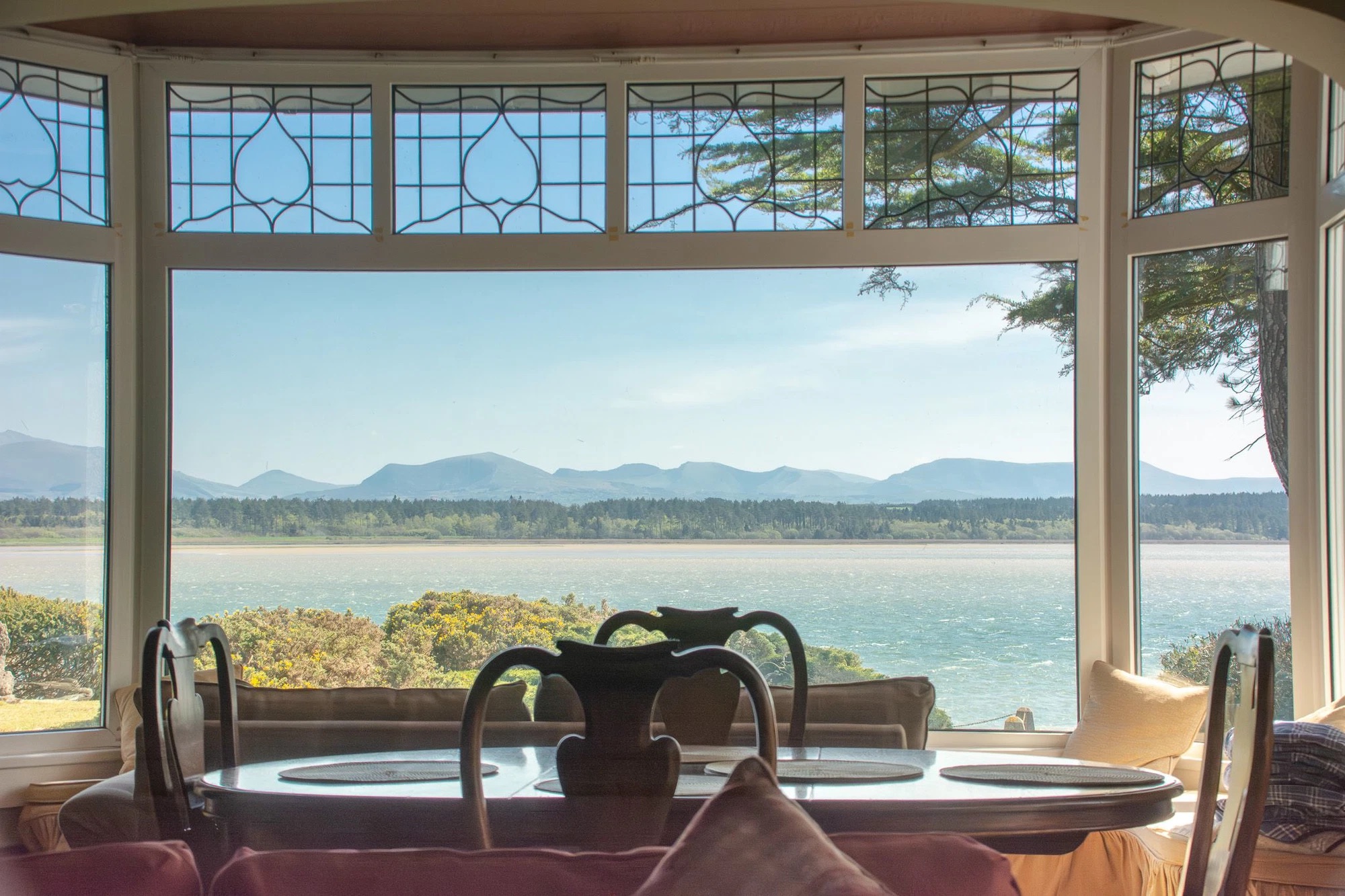 Big open window with sea view at Warren Point Holiday Cottage in Malltreath, Anglesey near Newborough Forest and Beach.