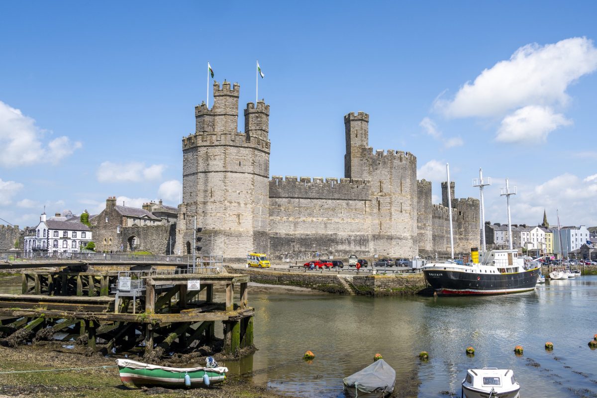 An image of Caernarfon castle from over the water, North Wales
